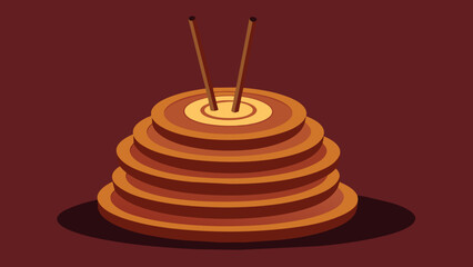  A stack of intricately designed circular discs made of bronze are shown next to a set of wooden dowels used in ear candling.