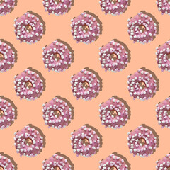 Repeating pattern of pink gingerbread cookies with marshmallows on a peach background. Flat lay