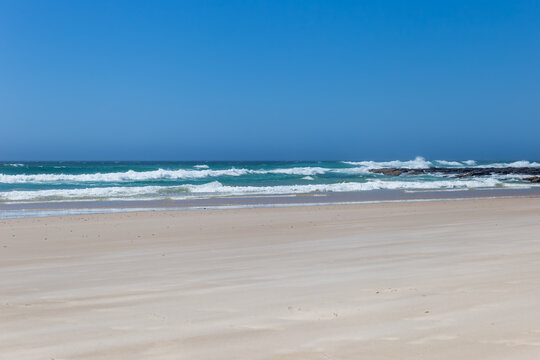 Large empty Beach with White Sand at Shelly Beach, New South Wales, Australia.