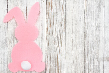 Easter bunny rabbit background on weathered wood