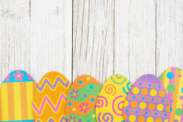 Easter egg background on weathered wood