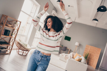 Plakaty  Photo of good mood adorable lady dressed striped pullover having fun indoors apartment room