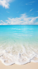 Fototapeta na wymiar White sand beach, calm turquoise waves rolling in, wide angle, soft sunlight
