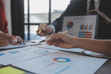 Finance manager meeting discussing company growth project success financial statistics, professional investor working start up project for strategy plan with document, laptop and digital tablet.