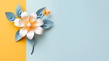Fototapeta na wymiar Paper flowers on blue and yellow background