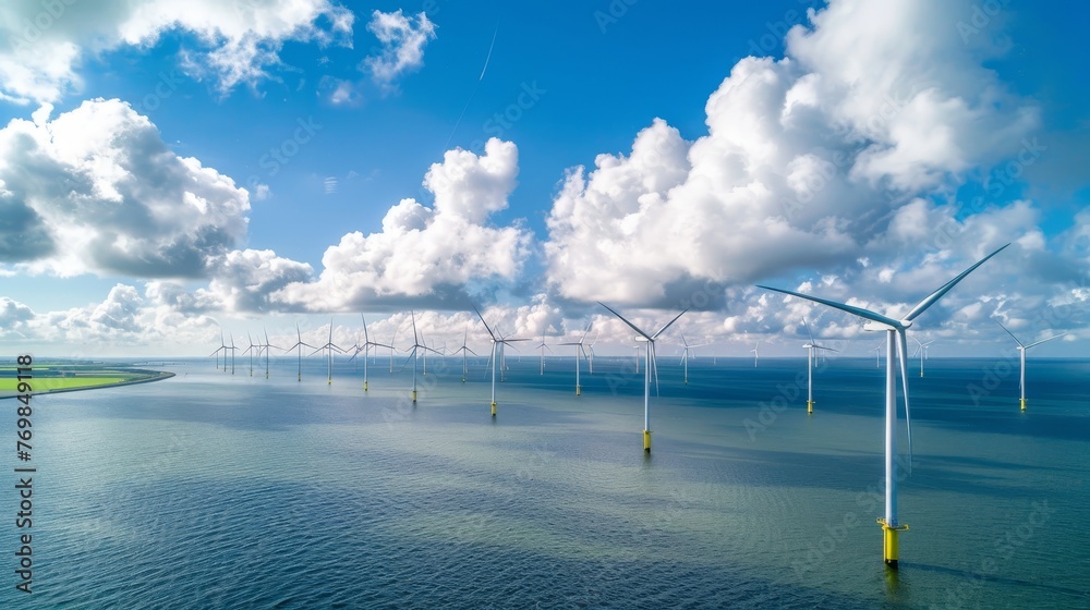 Aufkleber offshore windmill park with clouds and a blue sky. flevoland netherlands ijsselmeer windmill park ae