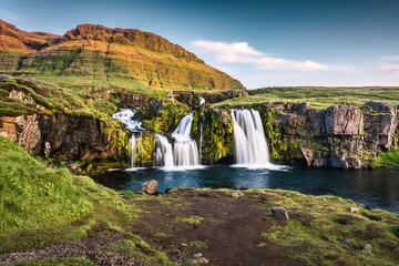 Kirkjufellsfoss waterfall flowing in summer at Snaefellsnes peninsula, Iceland - 769849739
