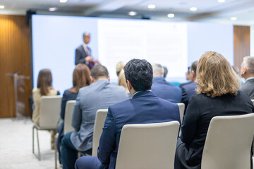 Business conference, corporate presentation, workshop, coaching training, news conference, company meeting, public or political event. Public speaking concept.