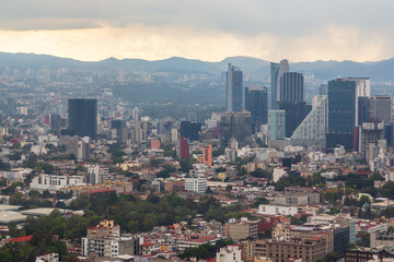 Fototapeta na wymiar Mexico City, Mexico - 29 November 2022: Aerial view of Mexico City from Torre Latinoamericana at sunset