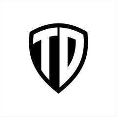 TD monogram logo with bold letters shield shape with black and white color design
