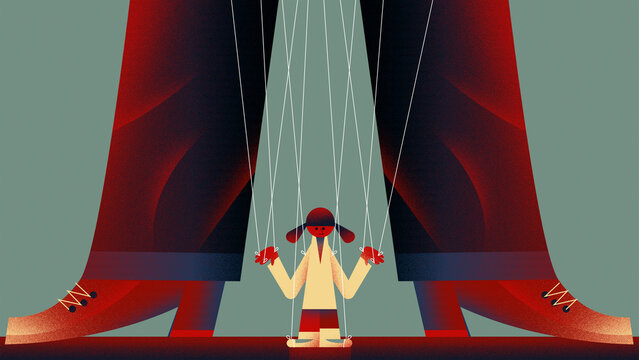 Large man controlling small female puppet