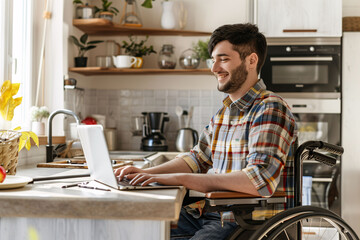 An entrepreneur in a wheelchair working with a laptop at home. Disability, entrepreneur and inclusion concept.