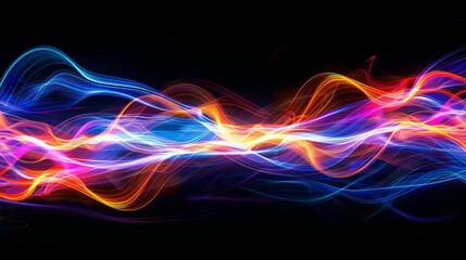 Colorful light trails creating dynamic motion effect on black background