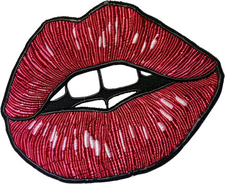 Embroidered patch of red lips in pop art style cut out on transparent background
