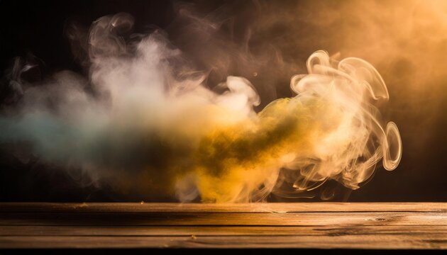 conceptual image of multi colored smoke isolated on dark black background and wooden table