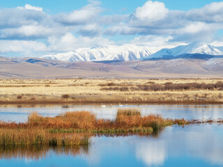 Beautiful autumn mountain lake and mountains.