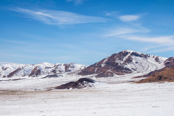 Fototapeta na wymiar Minimalist nature background of snowy mountainside.