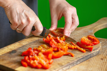 Italian bread and ingredients - parmesan, olive oil, tomato, spice and herbs. Close up chef's hands...