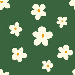 Fototapeta na wymiar A set of floral patterns and cover designs in the style of the 70s with groovy daisy flowers. Retro floral vector design. Style of the 60s, 70s, 80s