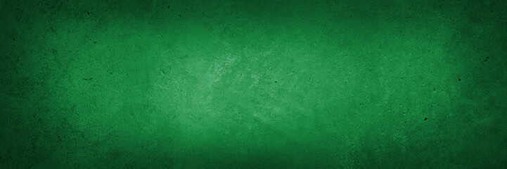 Green textured concrete wall background. Dark edges