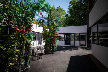 image of the staff of a retail space and a coffee shop with herbal surroundings