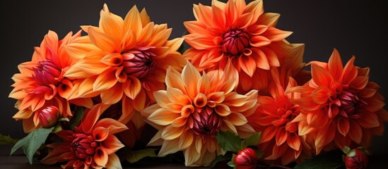 A beautiful bouquet of orange flowers is elegantly arranged on a table, showcasing the creative art...