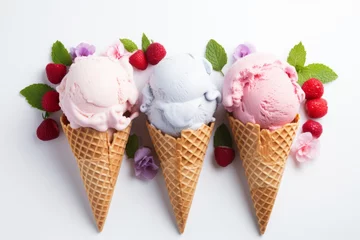 Stoff pro Meter Variety of ice cream scoops fruit flavors in waffle cones against pure white background overhead view © fahrwasser