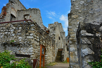 ruiny zamku na górze, castle, ruins of a castle on a hill against the blue sky	 - obrazy, fototapety, plakaty