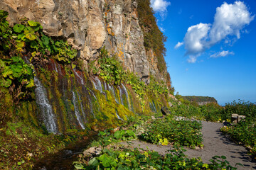 Rock with waterfalls, Iturup Island, South Kuriles - 769946544