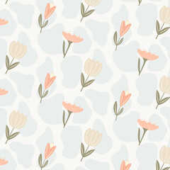 A delicate spring pattern with painted flowers and abstract shapes in the background