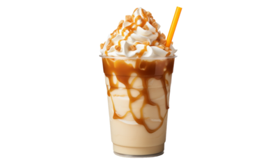 A cup of coffee adorned with whipped cream and drizzled caramel