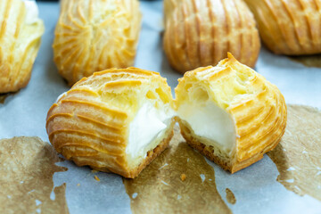 profiteroles, eclairs, choux pastry. Dessert. food concept. diet