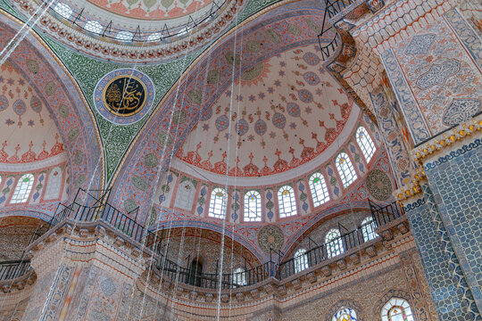Istanbul, Turkey - April 16, 2023: A picture of the colorful and gorgeous interior of the New Mosque, in Istanbul.