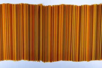 Food background, colorul dried pasta spaghetti, paralleled lines, wallpapers with stripes