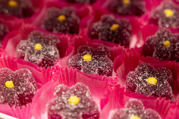 French or italian sweets, fruit jelly bonbons on display in confectionery shop in Milan, Italy...