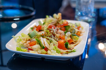 Green vegetables salad for turkish mixed grill meat, chicken wings, lamb, beef shashlik, kebab in restaurant