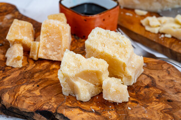 Tasting of 24 and 48 months aged Italian parmesan hard cheese from Parmigiano-Reggiano, Italy and...