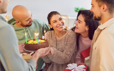 Happy birthday cake celebration, friendly group, family portrait, young diverse friends party together for special event. Smiling people gathering making fun, enjoy time, wishing great happiness, joy 