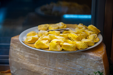 Italian food, fresh homemade stuffed pasta tortelli or ravioli dumplings ready to cook, Milan, Lombardy, Italy