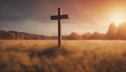 The cross on meadow autumn sunrise background
