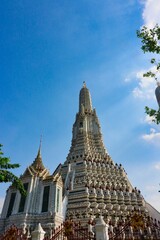 Wat Arun spectacular spires, pagoda, viharas and prangs, landmark architecture at the historic City center of Bangkok, Thailand