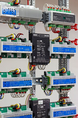 The electronic module for automatic control is installed in an electrical distribution cabinet.