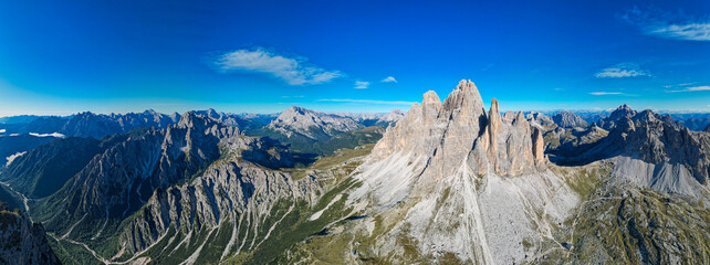 Tre Cime di Lavadera from above - Aerial view of the epic mountains in the Dolomites Italy 