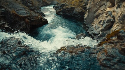 Dynamic HDR shot of a powerful river rushing through a canyon, showcasing the raw energy of nature.