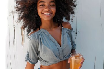 Young afro woman with afro style hair, called Sara, enjoying a drink on a sunny summer day - obrazy, fototapety, plakaty