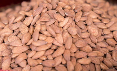 Almond seeds. Background of dried almond nuts.