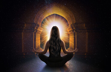 woman meditating front the universe
