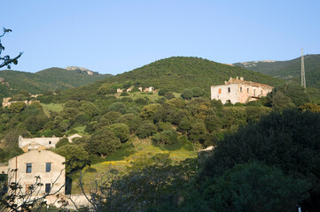 Fototapeta na wymiar Industrial buildings and machine of abandoned Mine of Montevecchio in Sardinia, Arbus, Guspini, Italy, Piscinas Ingurtosu. Medio Campidano, Sardegna, Italy