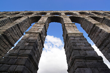 Segovia ancient roman aqueduct in Spain , Europe ; Unesco  World heritage site - 770022716