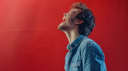 screaming male person on red background